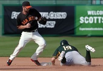 Sandoval pitches the ninth and Law scores a run in Giants blowout