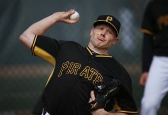 Pittsburgh Pirates catcher Russell Martin (55) scores on a Pirates James  Harrison's double in the first