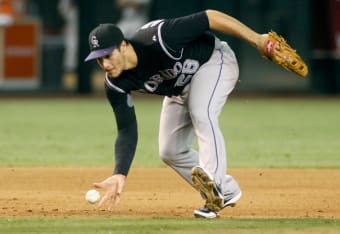 Chicago White Sox pitcher Mark Buehrle kicks the dirt as Cleveland Indians'  Jhonny Peralta rounds the bases after hitting a two-run home run in the  third inning of baseball action, Tuesday, May