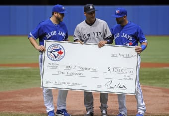 Rays present Derek Jeter with framed Don Zimmer jersey