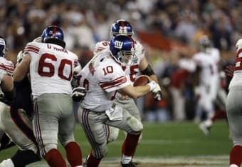 Eli Manning, Giants defeat New England Patriots in Super Bowl XLVI, 21-17,  in a case of deja vu 