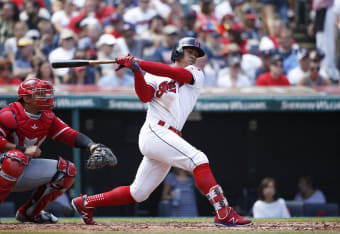 Boston Red Sox's Hunter Renfroe, left, comes in to field the single by Los  Angeles Angels' Mike Trout after it dropped in between Marwin Gonzalez,  center, and Michael Chavis (23) during the