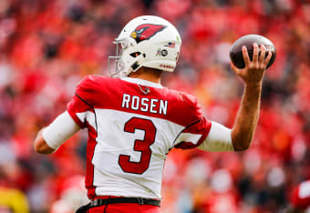 Patrick Mahomes Texas Tech Red Raiders Unsigned White Jersey Signaling with Fists to Helmet Photograph