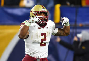 Boston College running back A J Dillon runs the 40-yard dash at the NFL  football scouting combine in Indianapolis, Friday, Feb. 28, 2020. (AP  Photo/Charlie Neibergall Stock Photo - Alamy