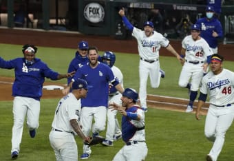 Reyes delivers clutch hit in Cubs debut, but Nationals triumph