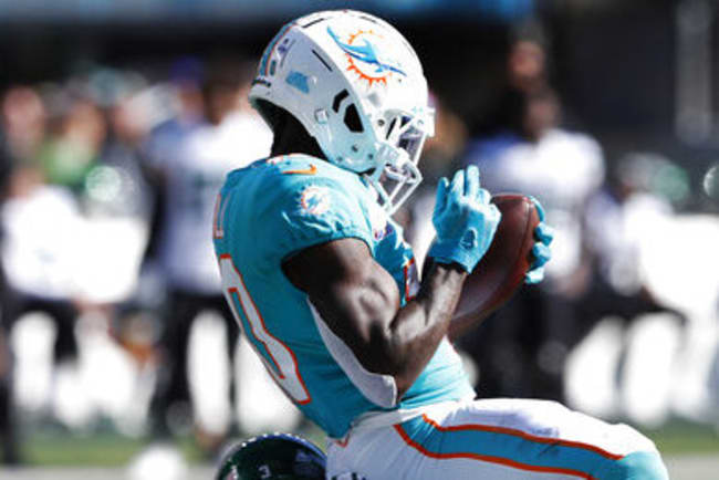 Tyreek Hill injury update: Dolphins receiver in walking boot after Jets  loss - The Phinsider