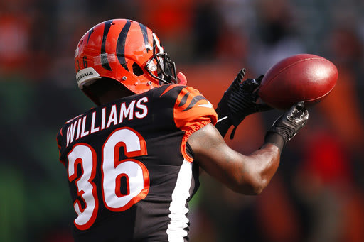 NFL suspends Tart, Williams for stepping on opponents