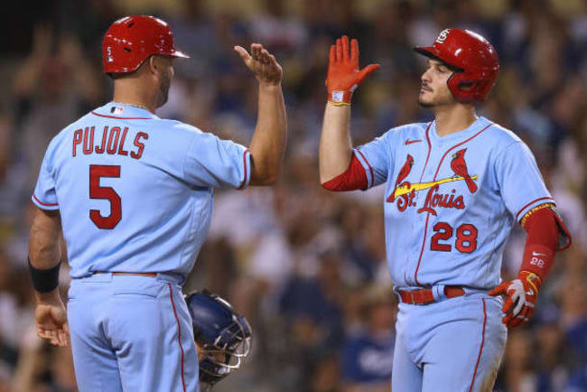 Cardinals clinch NL Central title by beating Brewers 6-2 National