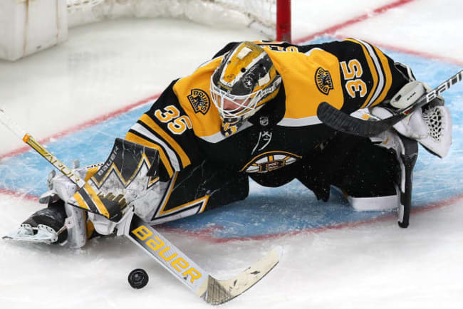Bruins bust out for 8-1 victory over Devils as Rask honored