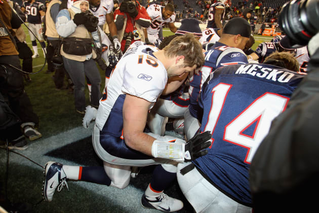 Jerseys worn by Tim Tebow fans commemorate the various phases of