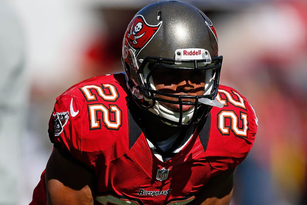 Tampa Bay Buccaneers' Jay Taylor (6) watches a replay as he