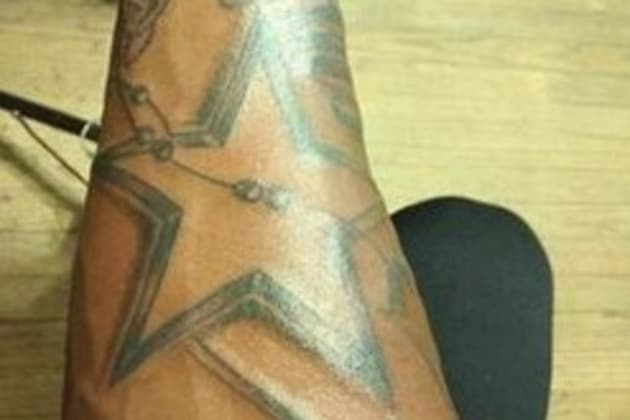 Dallas Star with Skyline tattoo