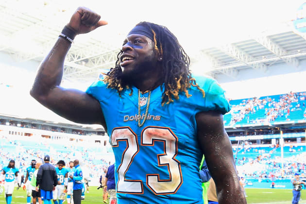 Dolphins RB Jay Ajayi Can Take a Hit and Keep Going—and Not Just