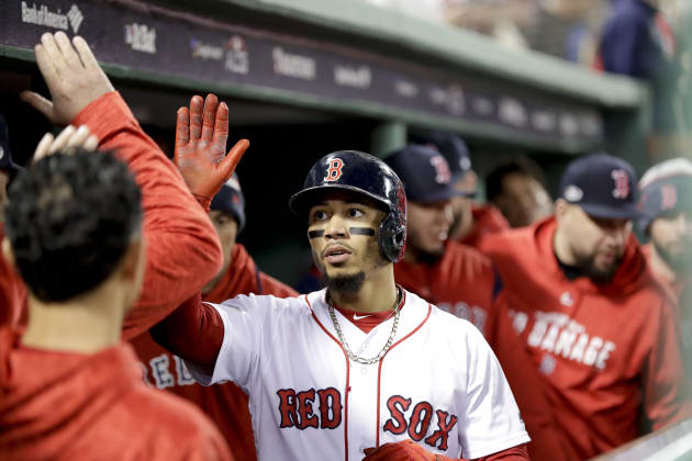 Red Sox rally to beat defending champions