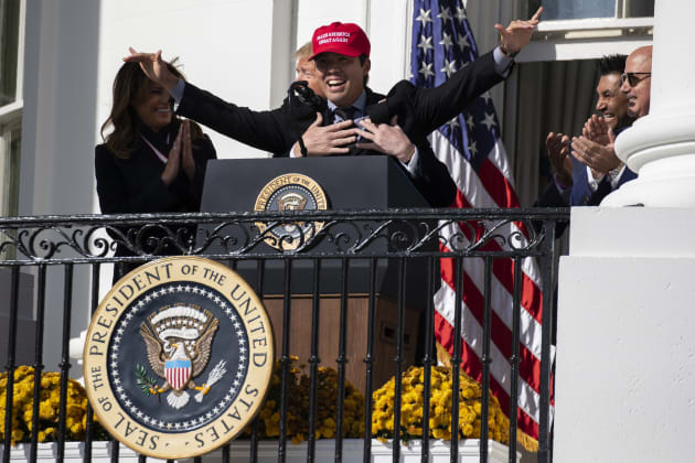 Washington Nationals catcher Kurt Suzuki wore a “Make America Great Again”  hat at the White House and got a hug from President Trump during the  World, By 8 News Now