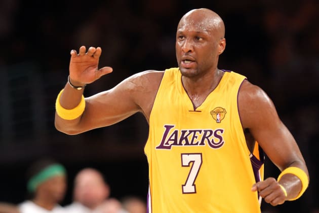 Look Ex Laker Lamar Odom s NBA Title Rings Up for Auction
