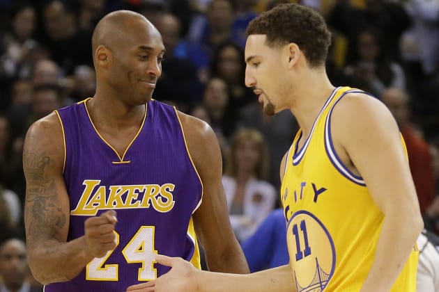 Kobe Bryant signs game-worn jersey for Klay Thompson