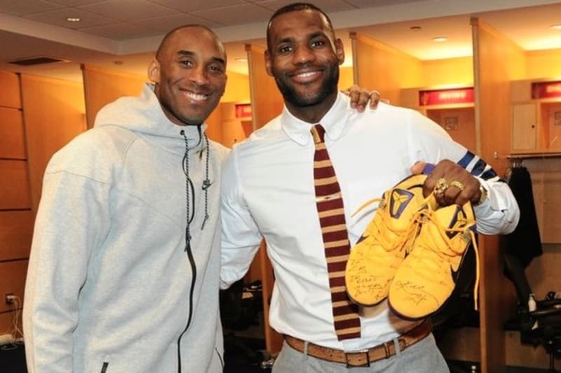 Kobe Bryant Signs Game-Worn Shoes for 
