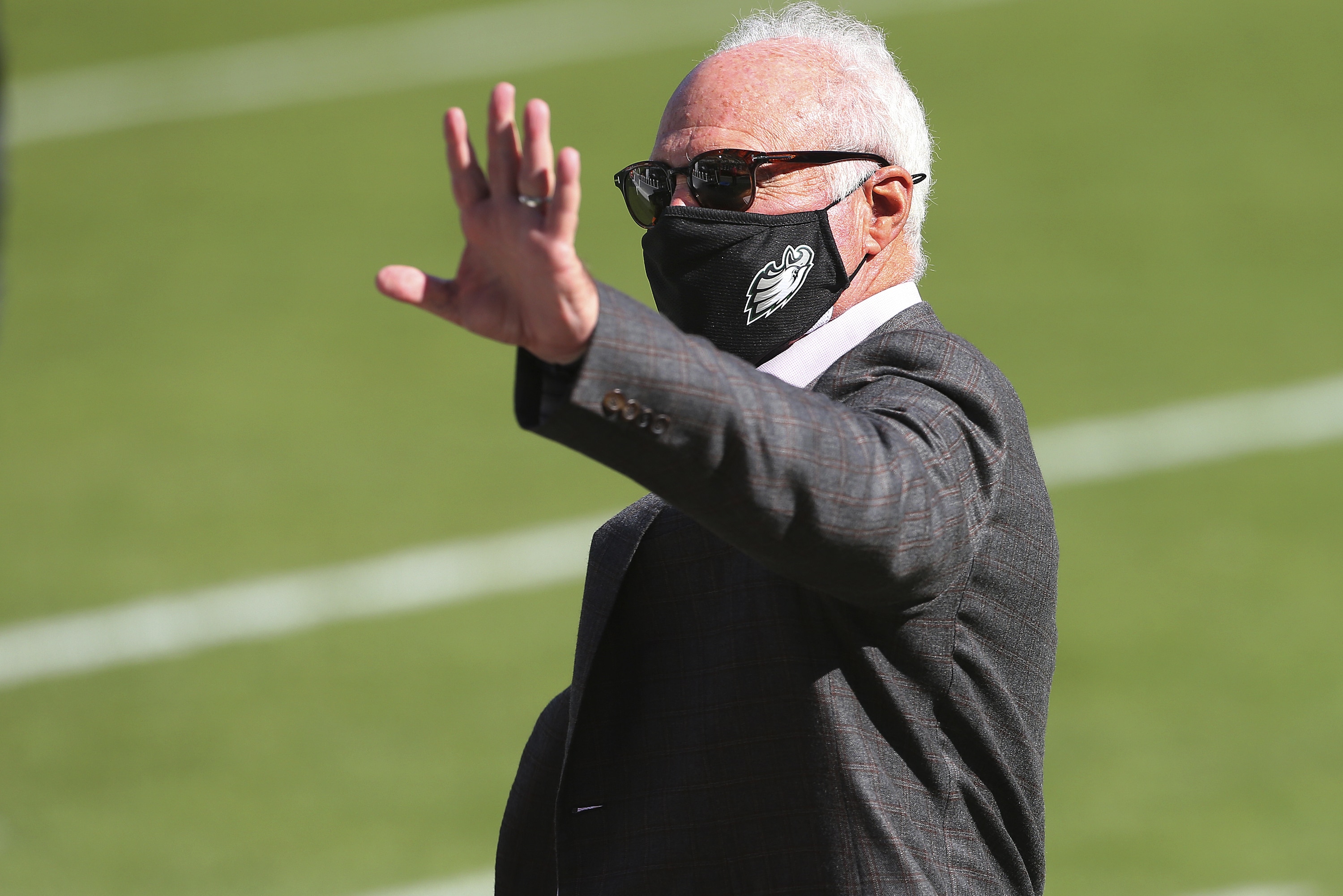 Philadelphia Eagles Chairman and CEO, Jeffrey Lurie waves before an NFL football game against Baltimore Ravens, Sunday, Oct. 18, 2020, in Philadelphia. (AP Photo/Rich Schultz)