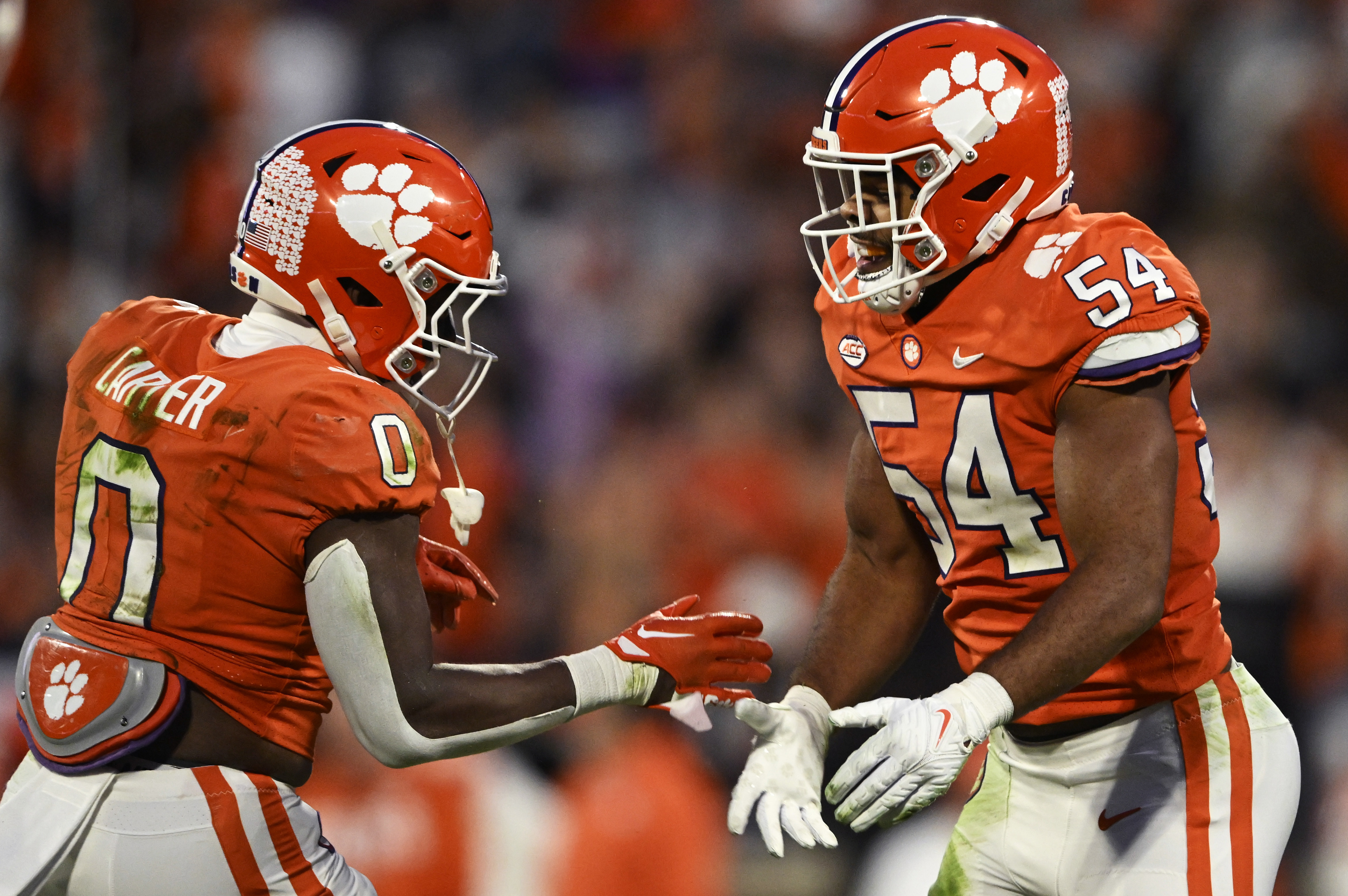 Jaguars select Travis Etienne, makes history as he joins Clemson teammate  Trevor Lawrence