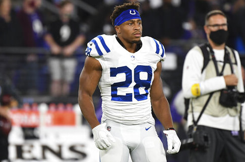 Running back Jonathan Taylor, in a contract dispute, not at Colts practice  as he rehabs ankle