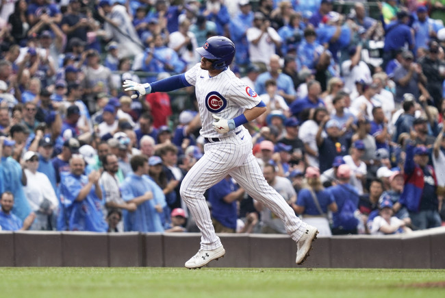 Swanson and Candelario go deep as the Cubs hold off the Braves 8-6