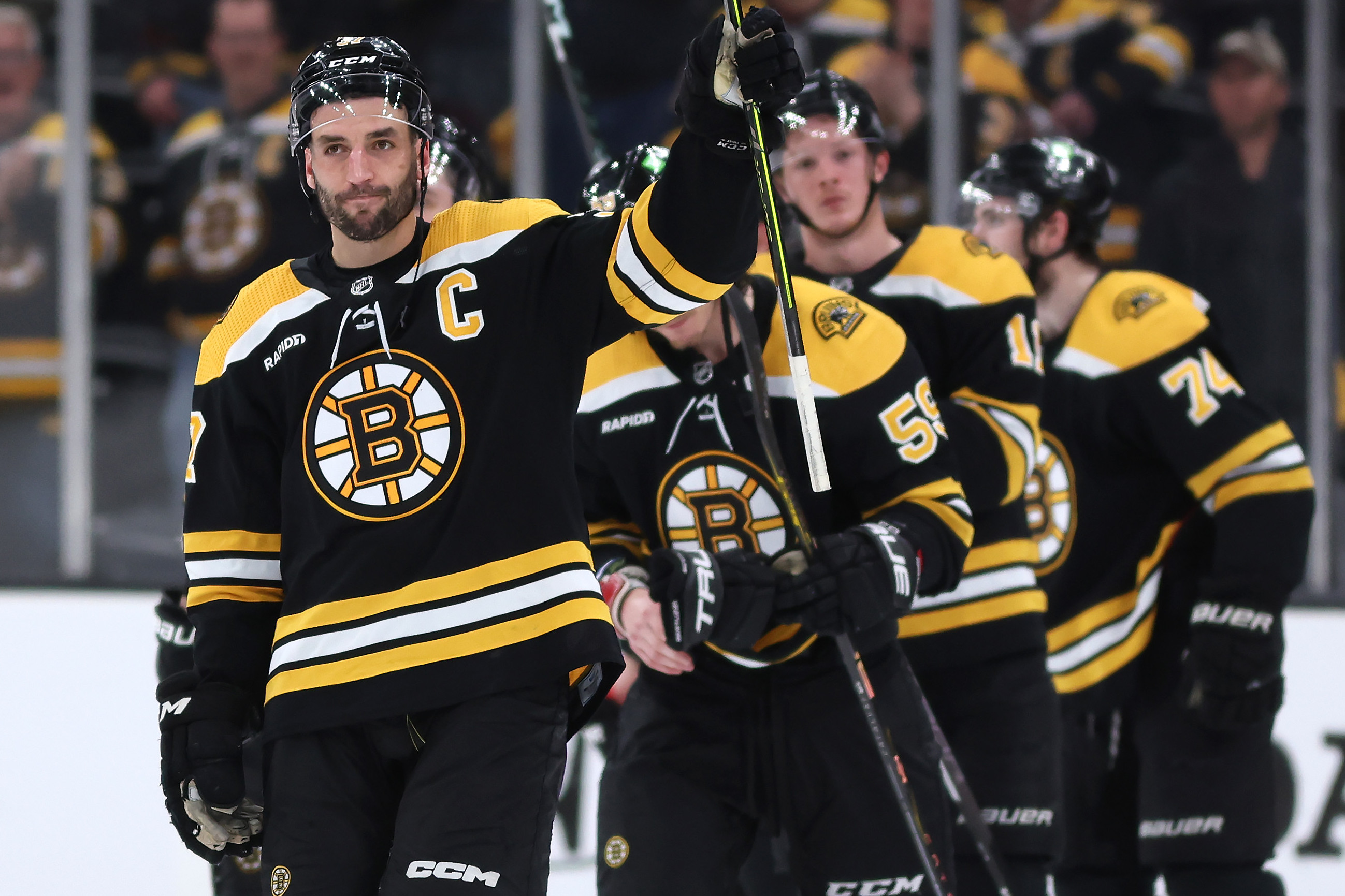 Boston Bruins cement place as the best in the NHL by beating Tampa Bay 2-1  to clinch division title