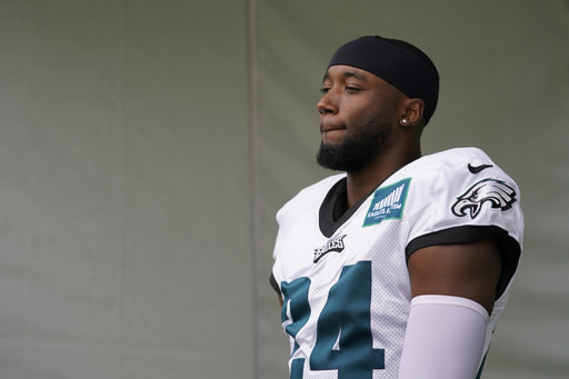 AP source: Hurts, Eagles agree to 5-year, $255M extension