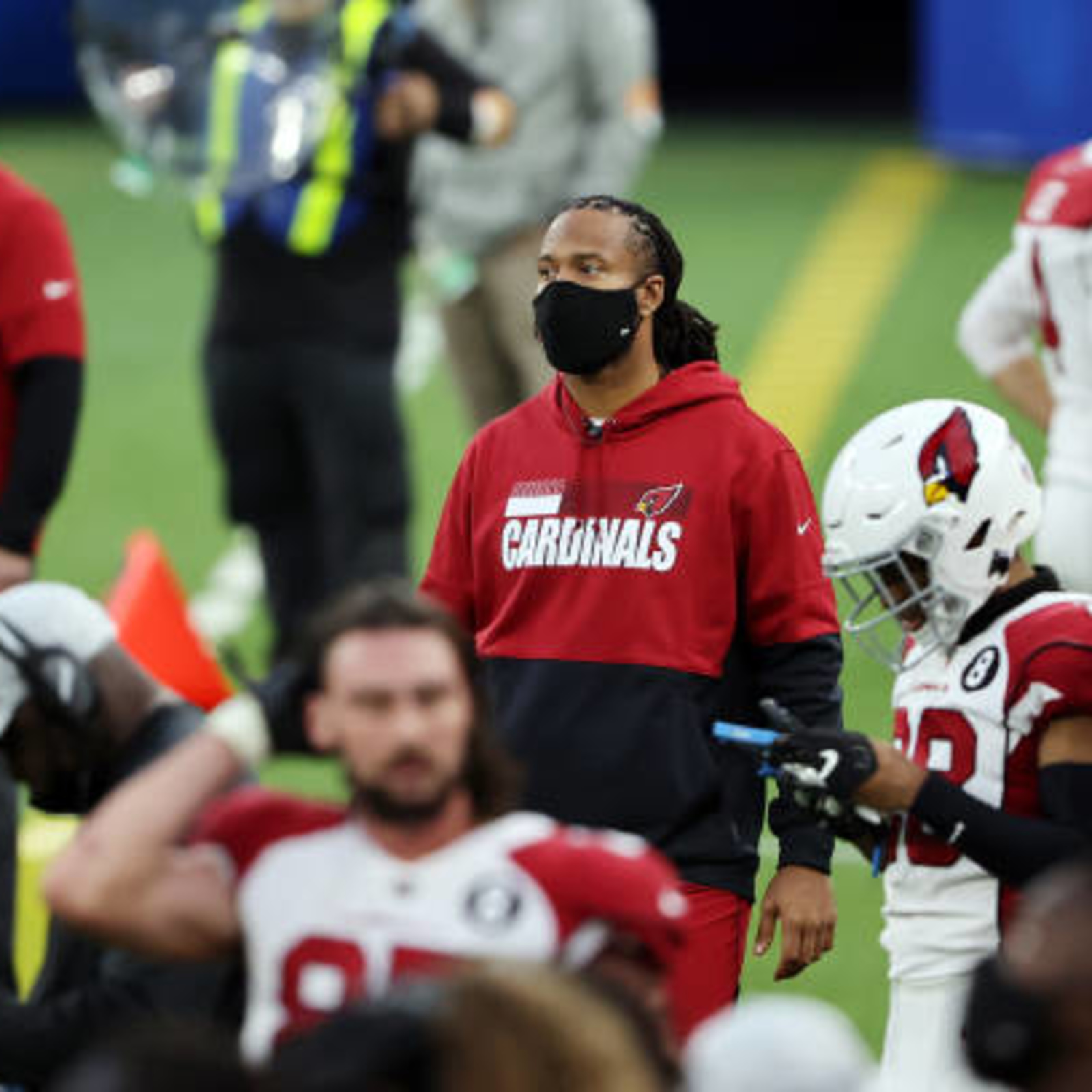 Larry Fitzgerald isn't retiring and his Cardinals teammates are