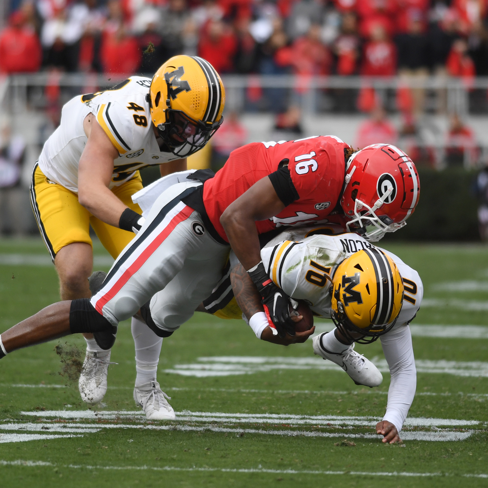 Former Georgia football S Lewis Cine from Haiti to early NFL draft pick