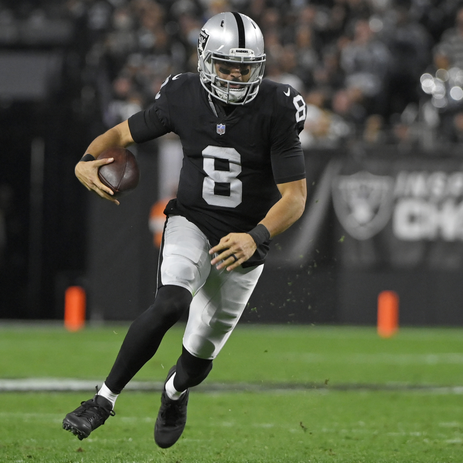 Raiders quarterback Marcus Mariota (8) dives for yardage against the  Indianapolis Colts in the …