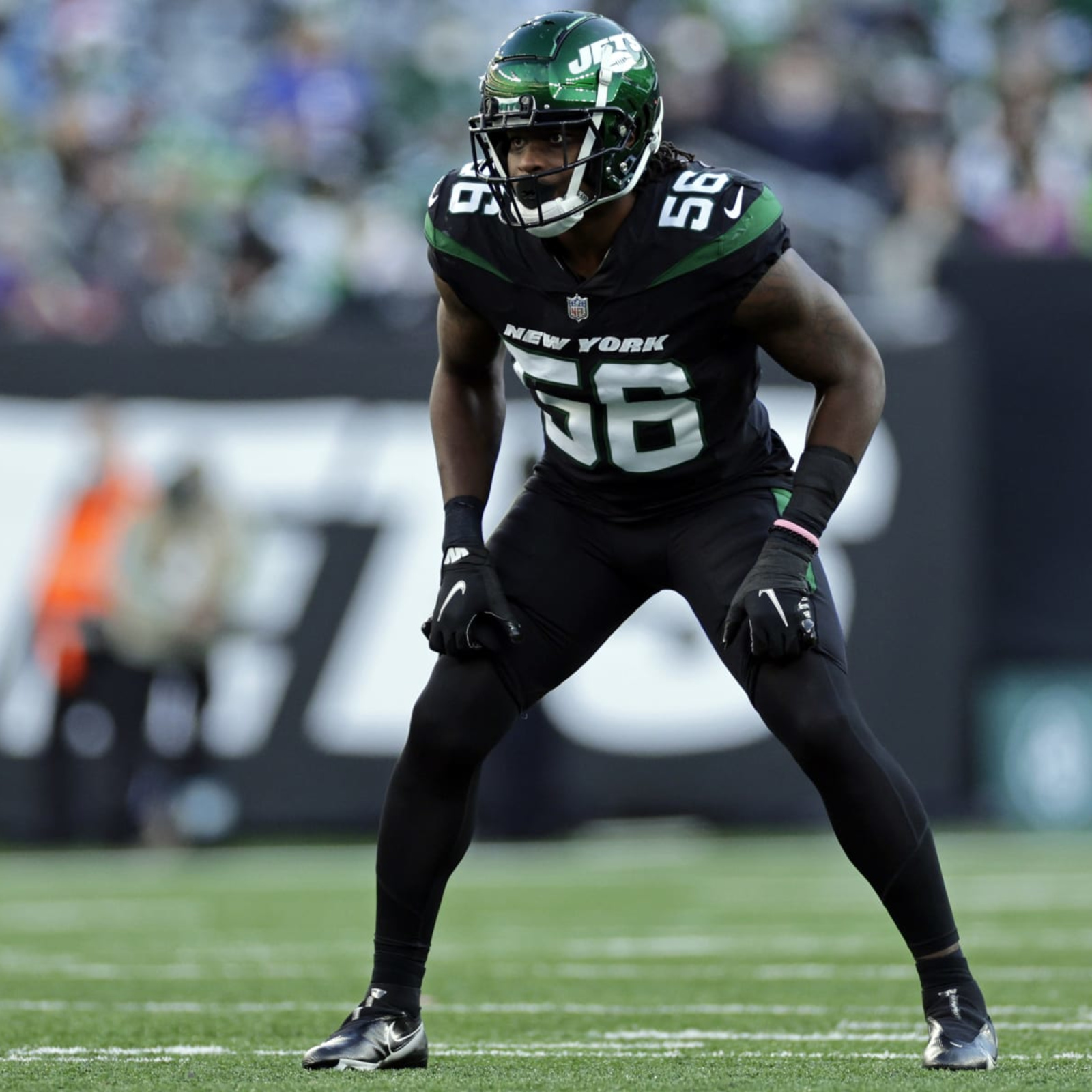 New York Jets linebacker Quincy Williams (56) reacts during an NFL