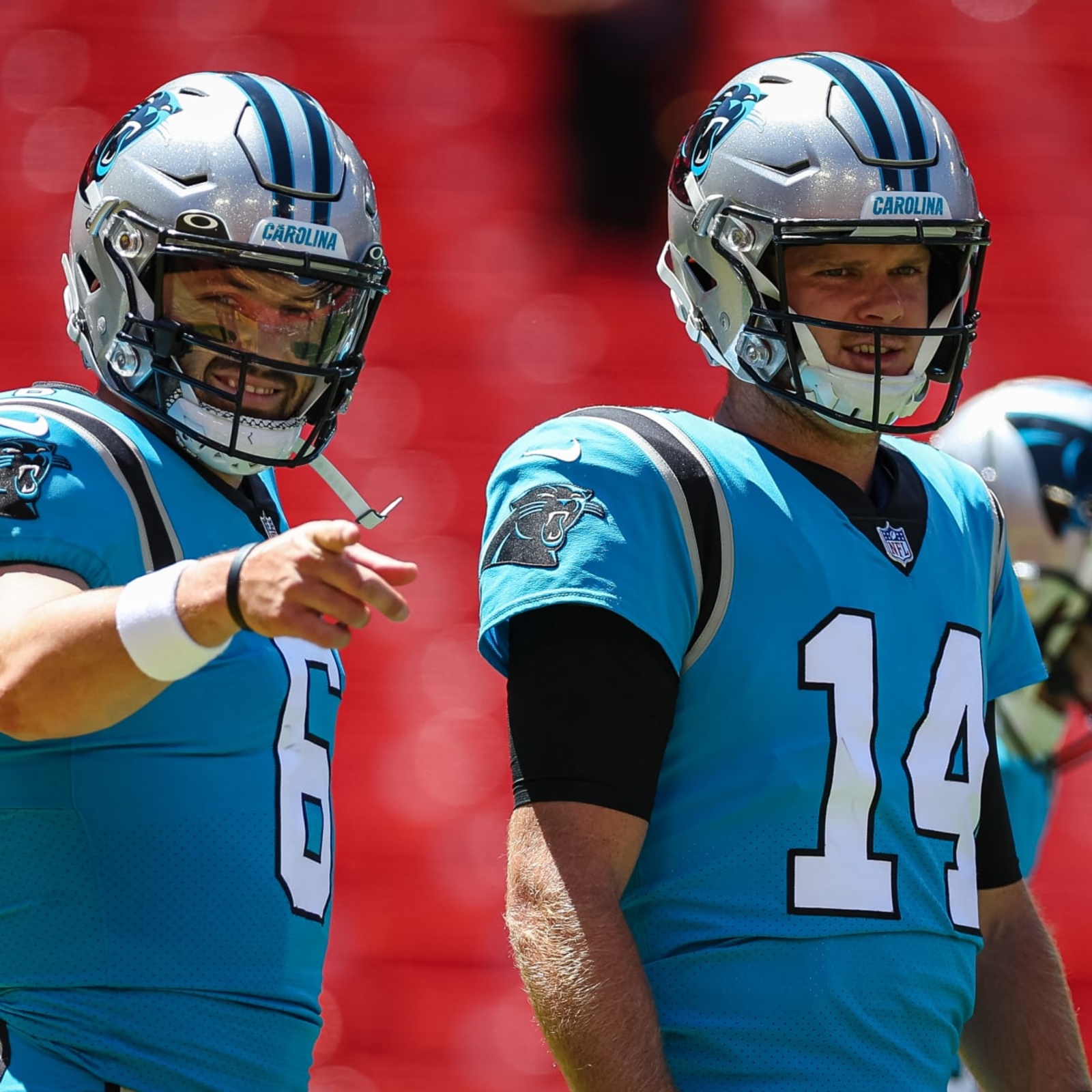 Carolina Panthers quarterback Sam Darnold (14) warms up before an