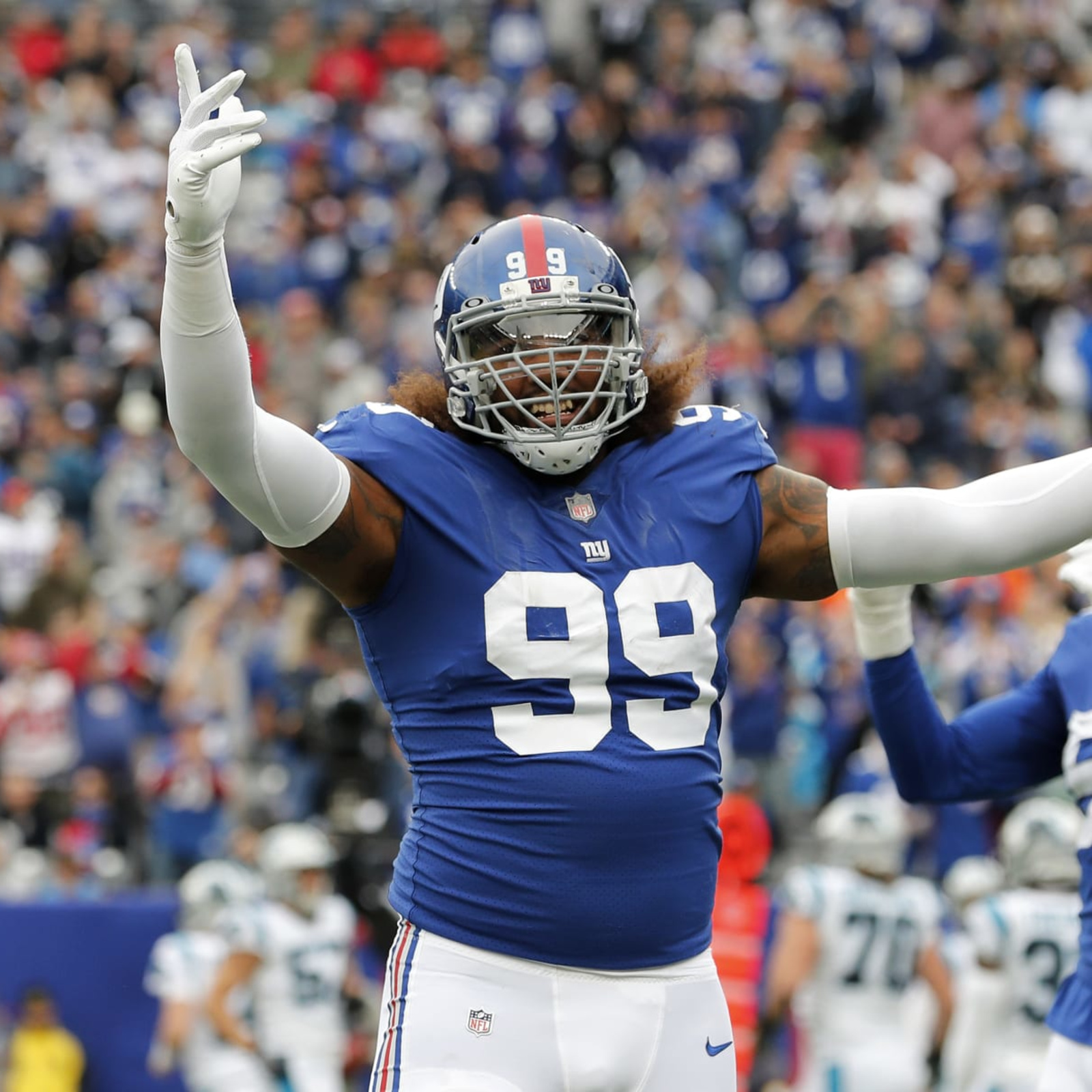 New York Giants defensive end Leonard Williams (99) takes the field to face  the Carolina Panthers in an NFL football game, Sunday, Oct. 24, 2021, in  East Rutherford, N.J. (AP Photo/Adam Hunger