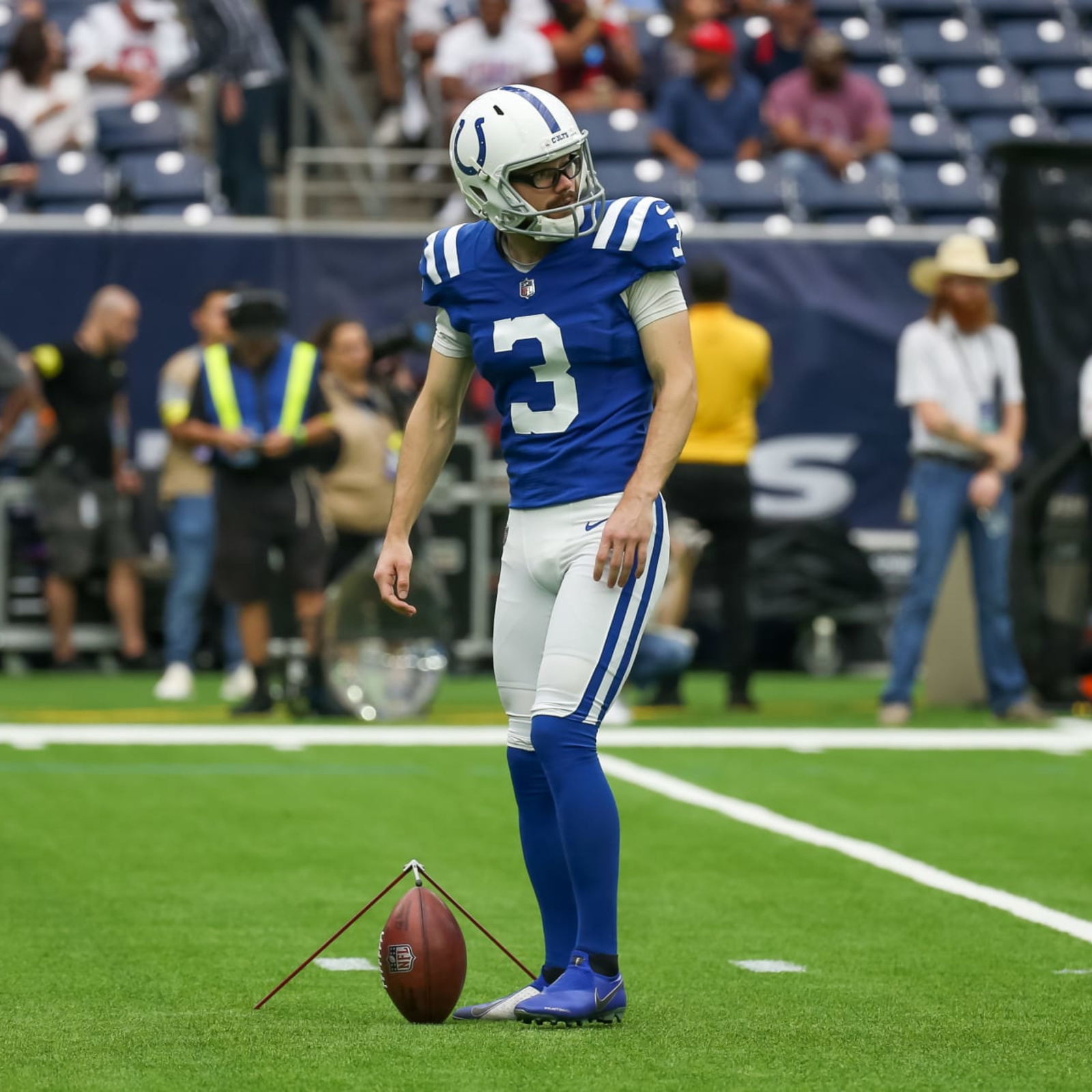 Indianapolis Colts kicker Rodrigo Blankenship (3) watches a video replay  during an NFL football …