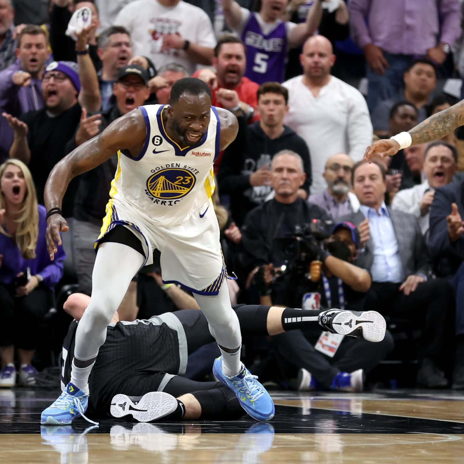 Draymond Green ejected from playoff game after appearing to stomp on  Domantas Sabonis' chest