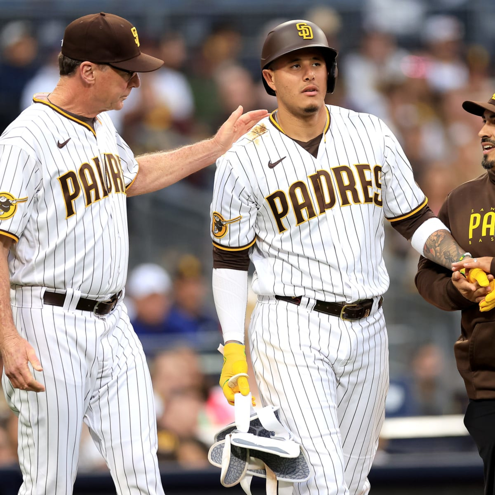 Manny Machado of the San Diego Padres rounds the bases after