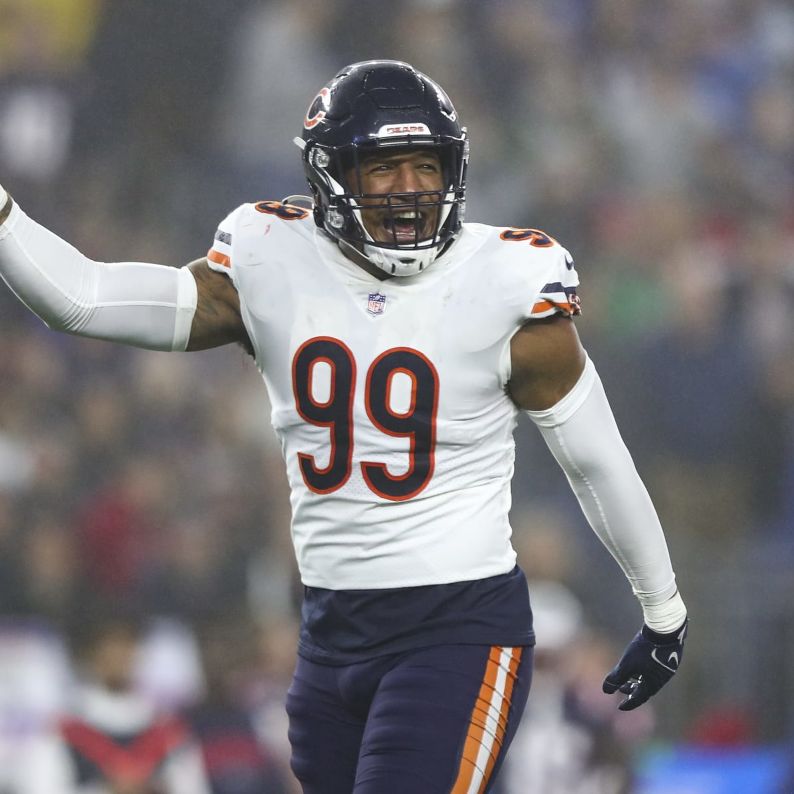 Chicago Bears defensive end Trevis Gipson (99) runs off the field