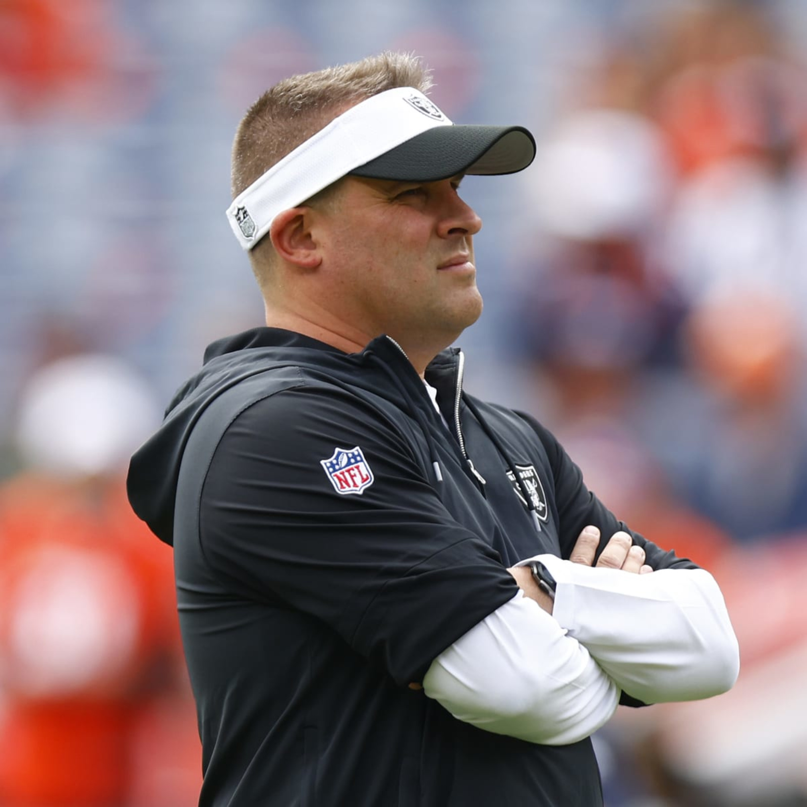 Las Vegas Raiders head coach Josh McDaniels watches replay during