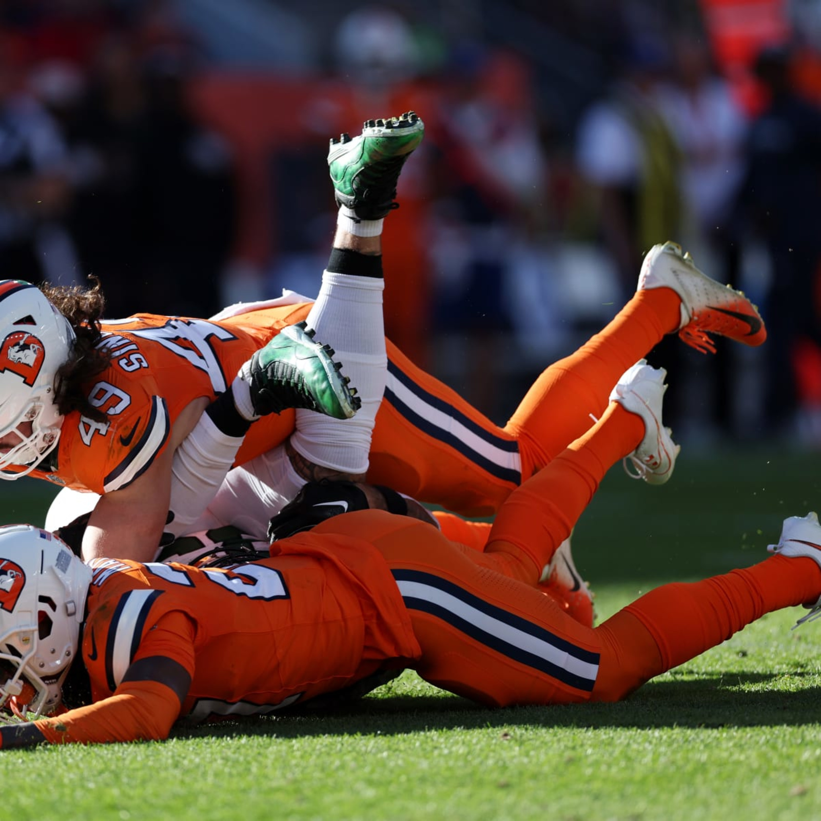 Denver Broncos linebacker Alex Singleton (49) looks into the