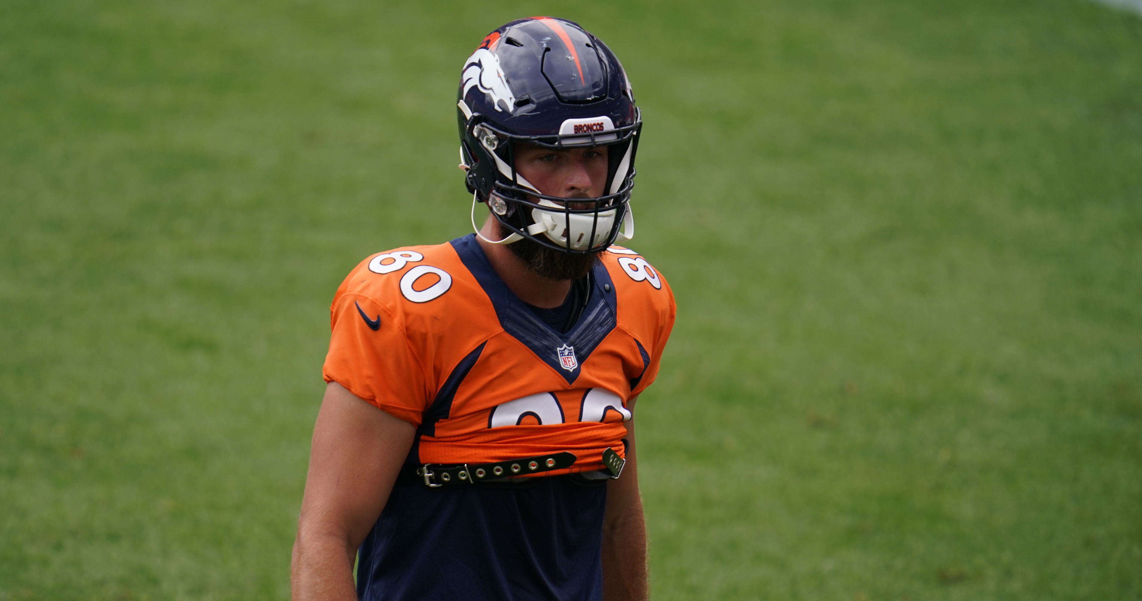 Denver Broncos tight end Jake Butt (80) takes part in drills