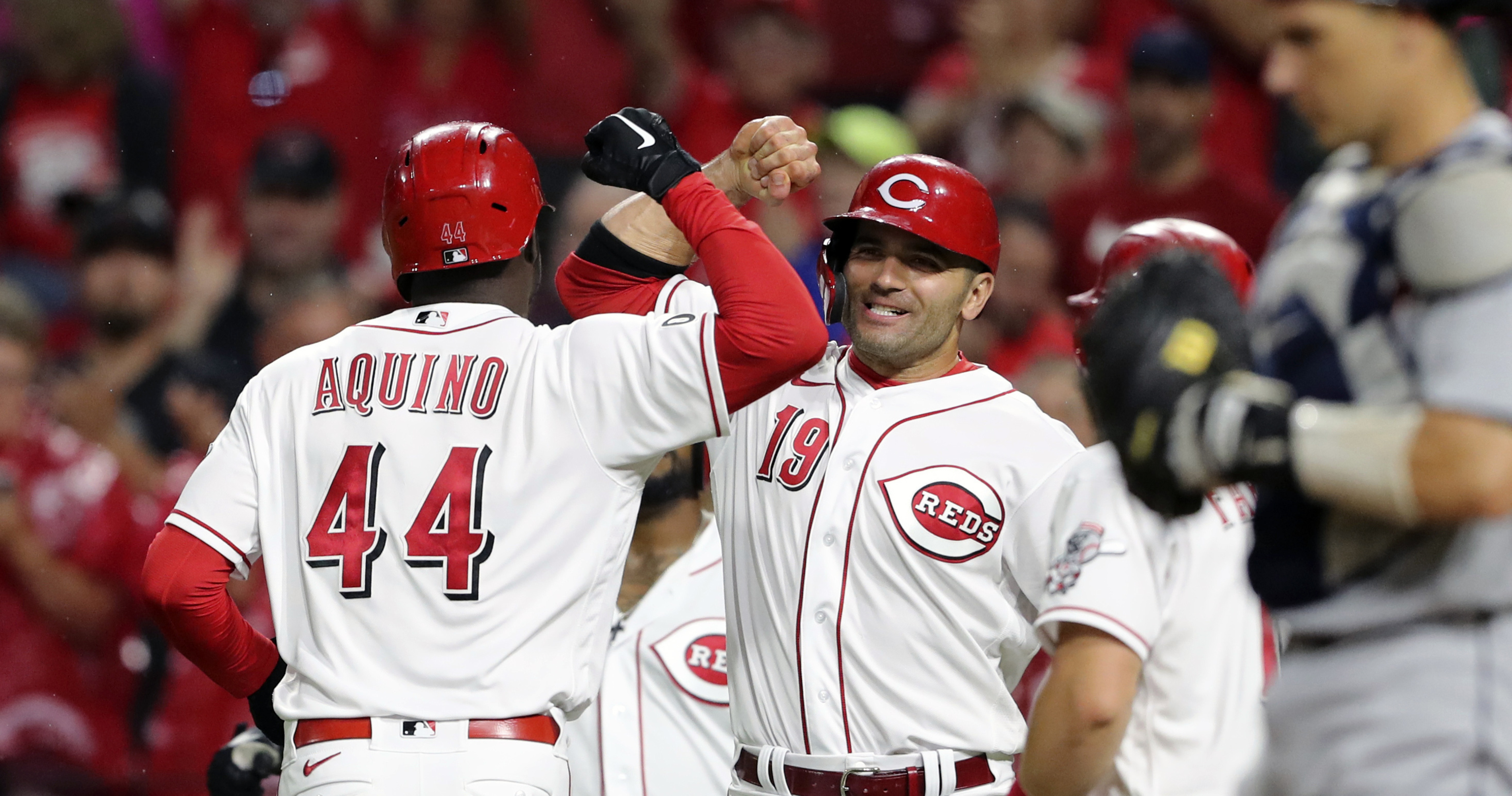 Reds' Joey Votto makes fan's day with signed baseball after first