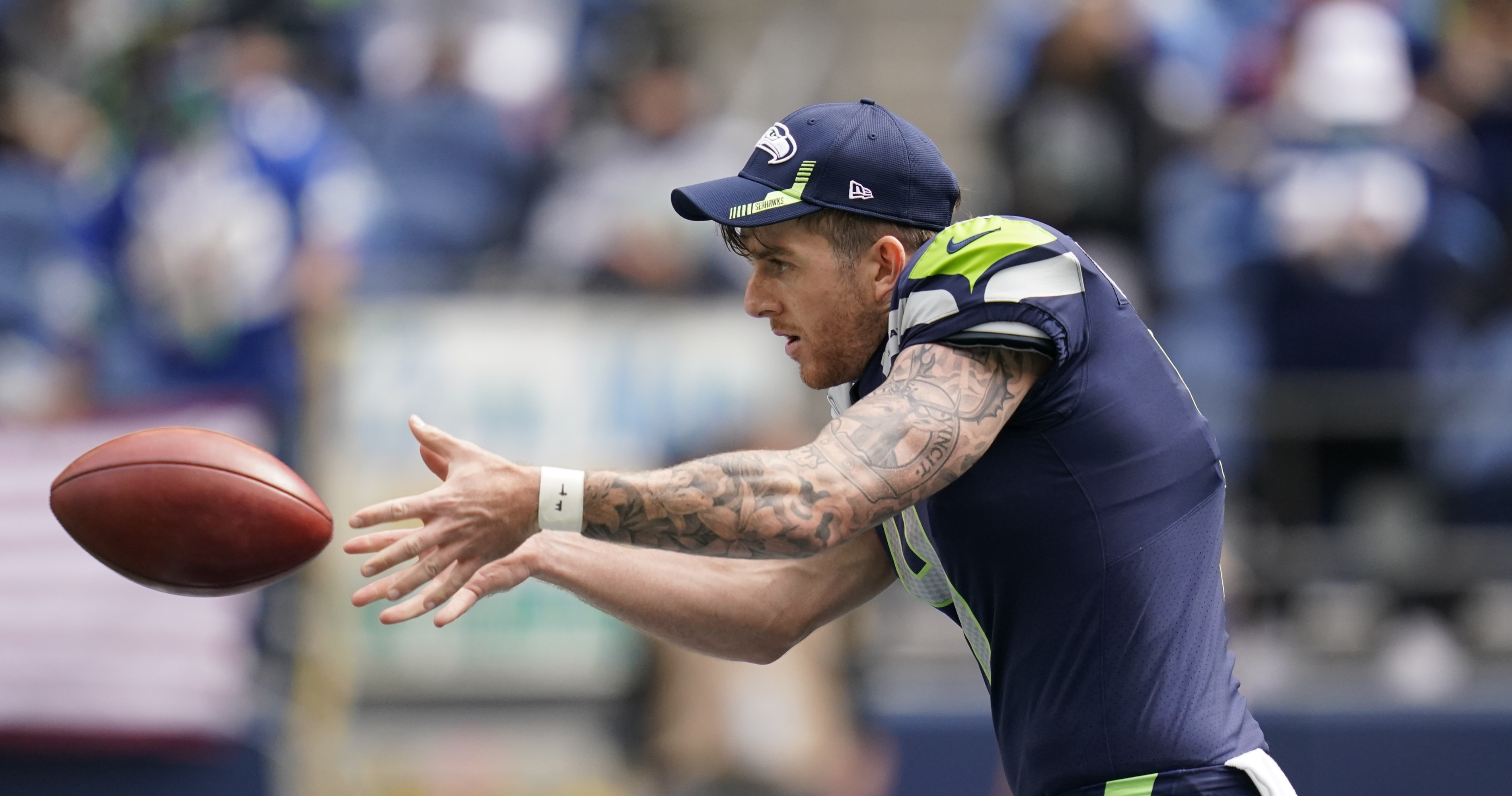 Michael Dickson of the Seattle Seahawks punts the ball during the