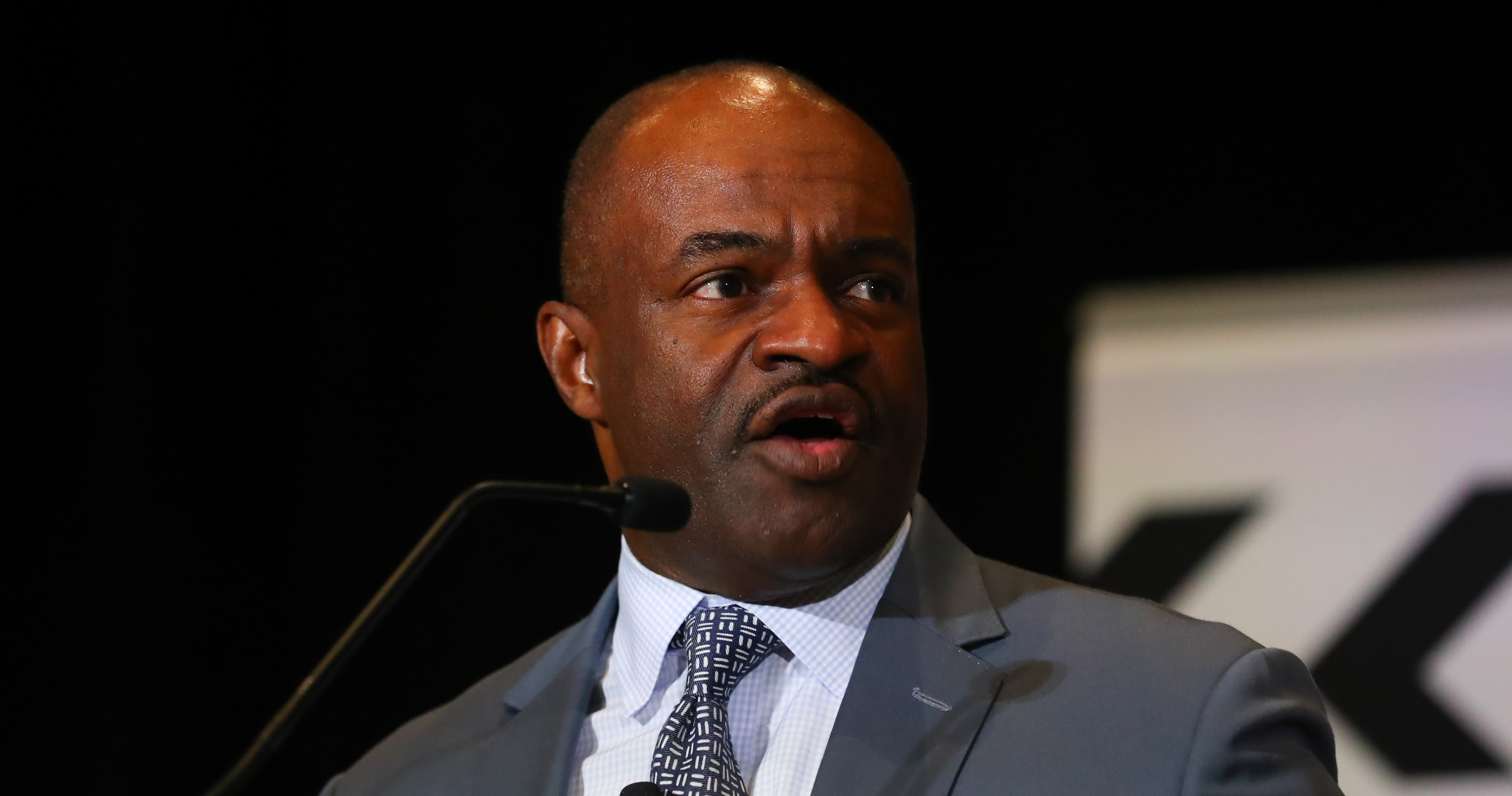 NFL players union chief DeMaurice Smith pauses as he speaks during