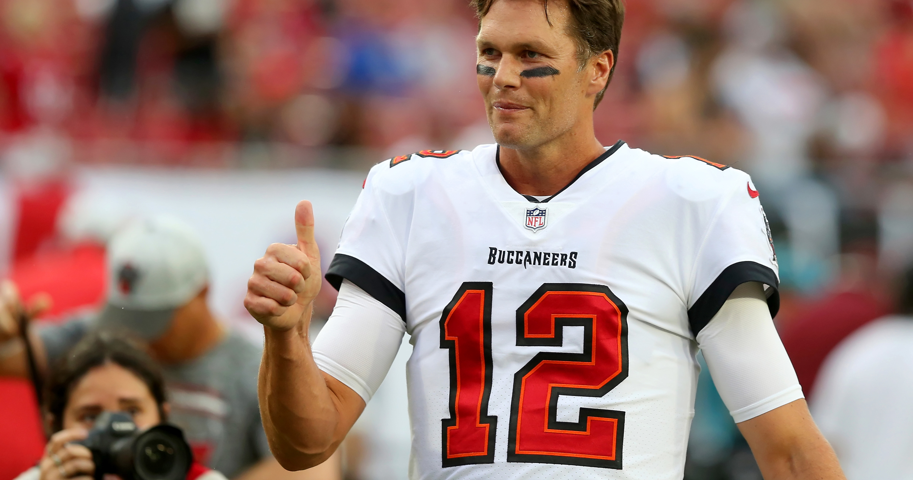 Tom Brady shrugs off thumb injury to throw two touchdowns in Buccaneers win  over Eagles