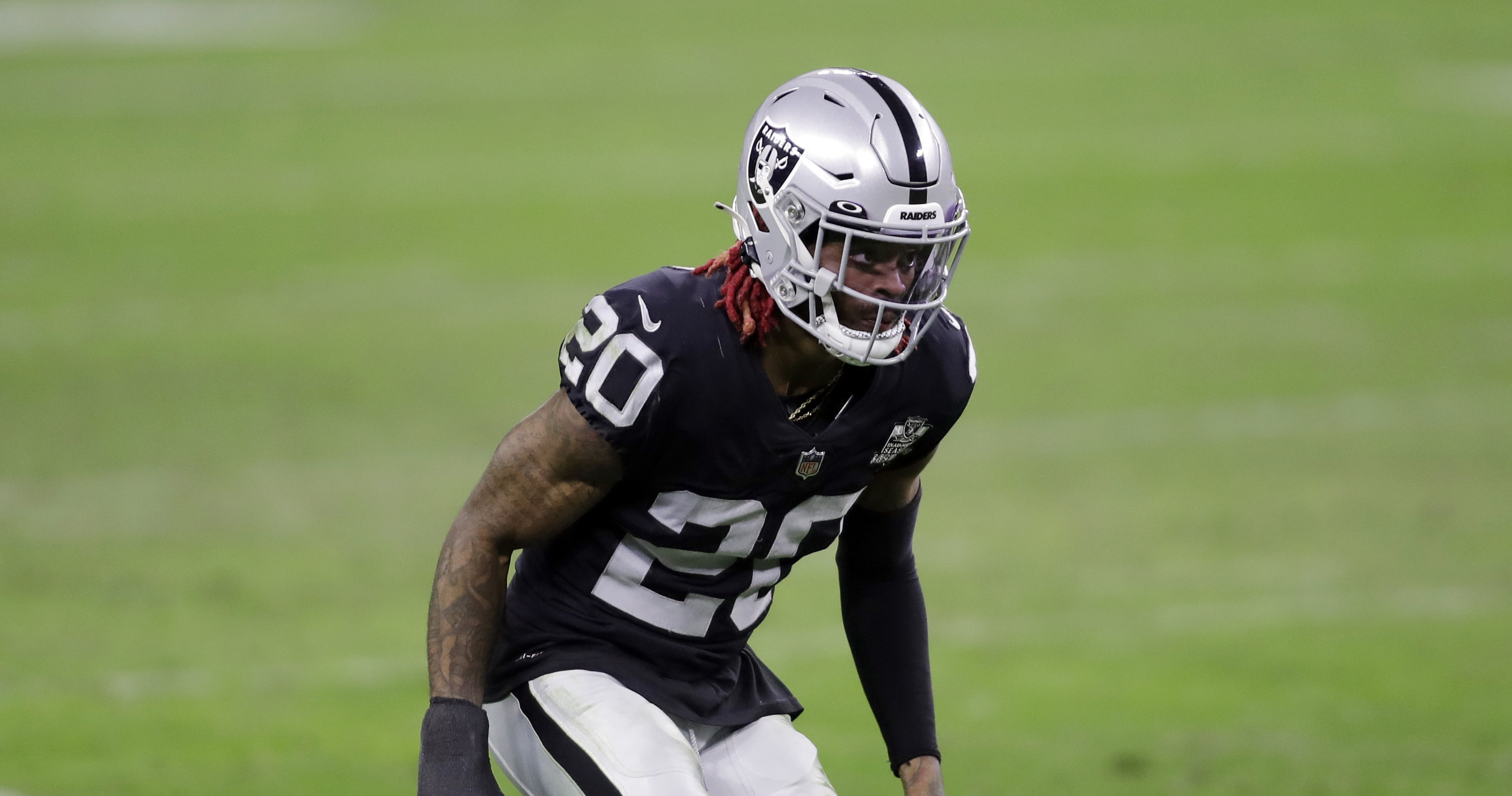 FILE - Las Vegas Raiders cornerback Damon Arnette warms up before an NFL  football game against the Pittsburgh Steelers, Sunday, Sept. 19, 2020, in  Pittsburgh. The Las Vegas Raiders waived 2020 first-round