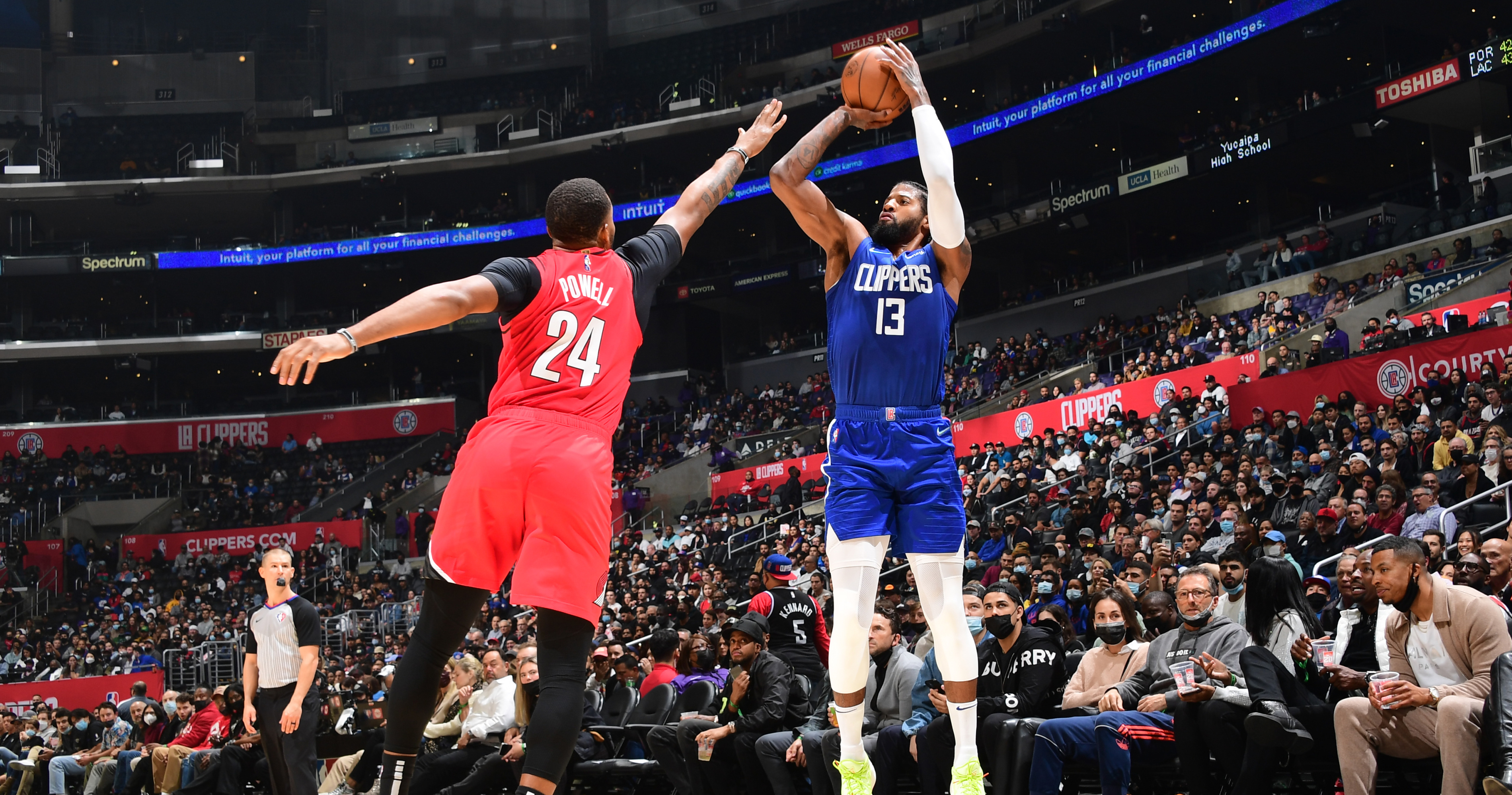 LOS ANGELES, CA - DECEMBER 03: Los Angeles Clippers Guard Paul George (13)  shoots a three pointer during a NBA game between the Portland Trail Blazers  and the Los Angeles Clippers on