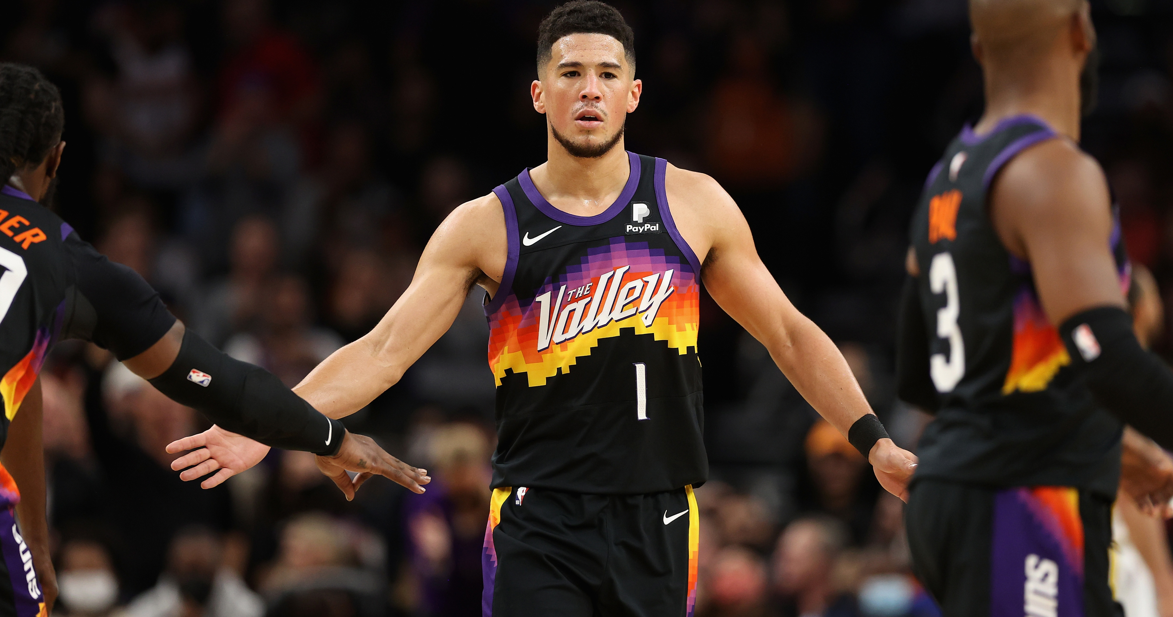 Suns Uniform Tracker on X: Devin Booker giving us a sneak peek at the new  Suns uniforms. Notice that the trim patterns match my latest predictions.  You can also see a little