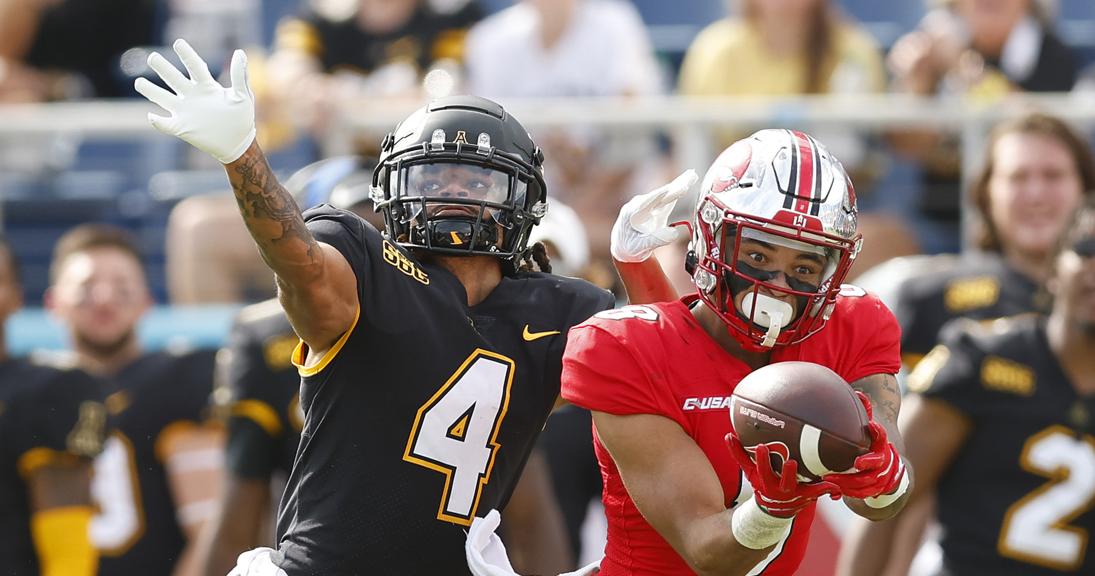 Western Kentucky plays Appalachian State in Roofclaims.com Boca Raton Bowl