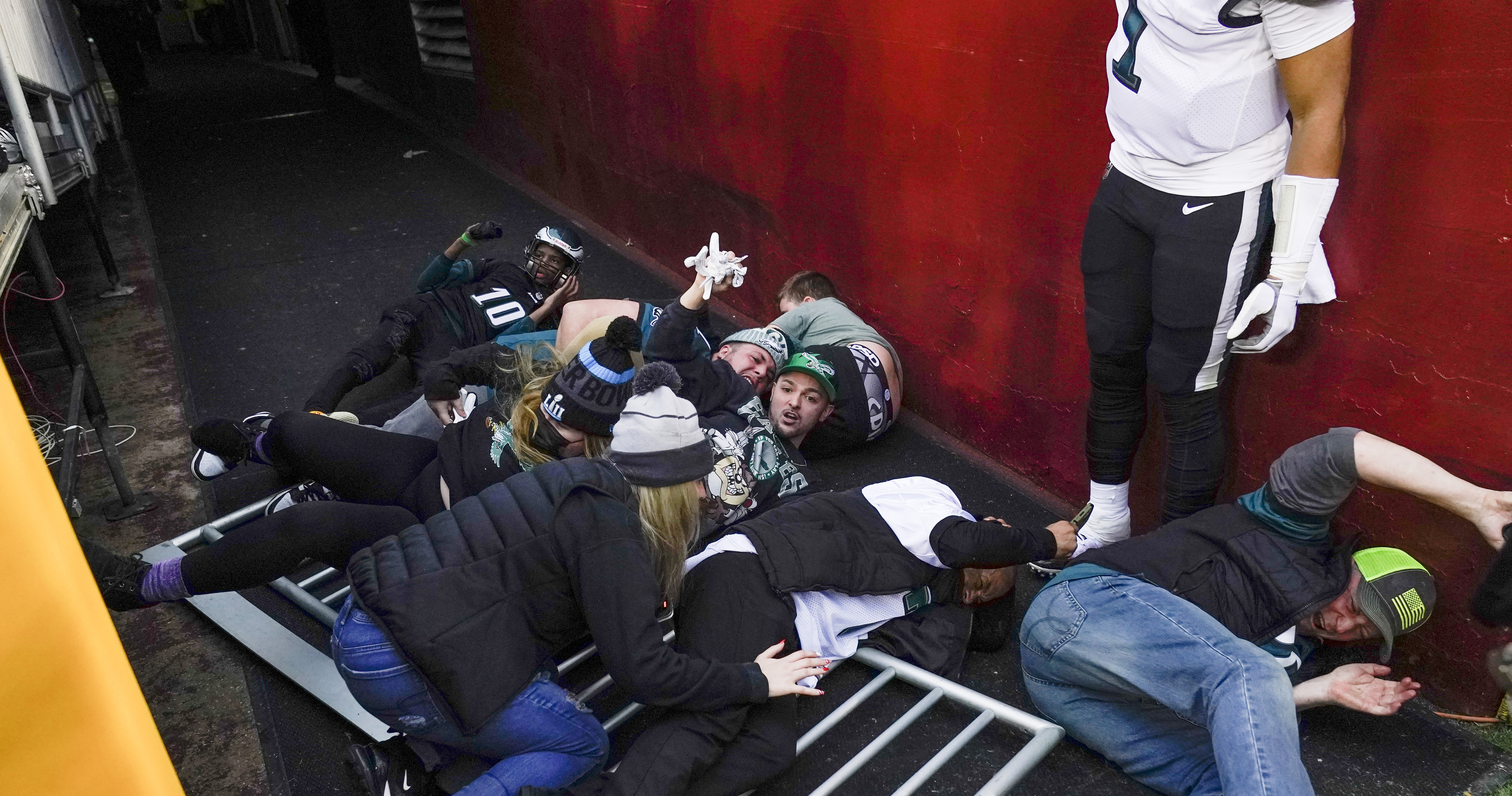 Philadelphia Eagles QB Jalen Hurts helps fans when railing collapses after  win over Washington Football Team, National Sports